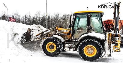 Уборка снега фронтальным погрузчиком