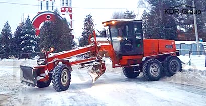 Уборка снега грейдером